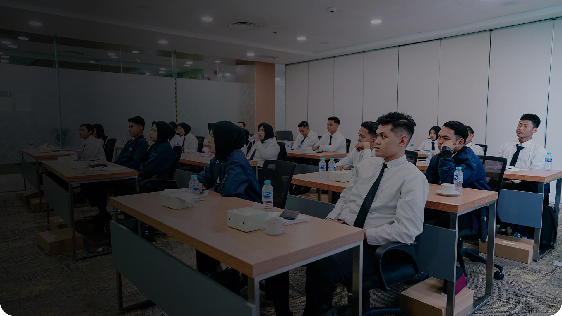 Modern classroom with students and instructors